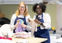 Housebuilder Gives £1,500 And Volunteers Support To Boost Baby Bank Charity